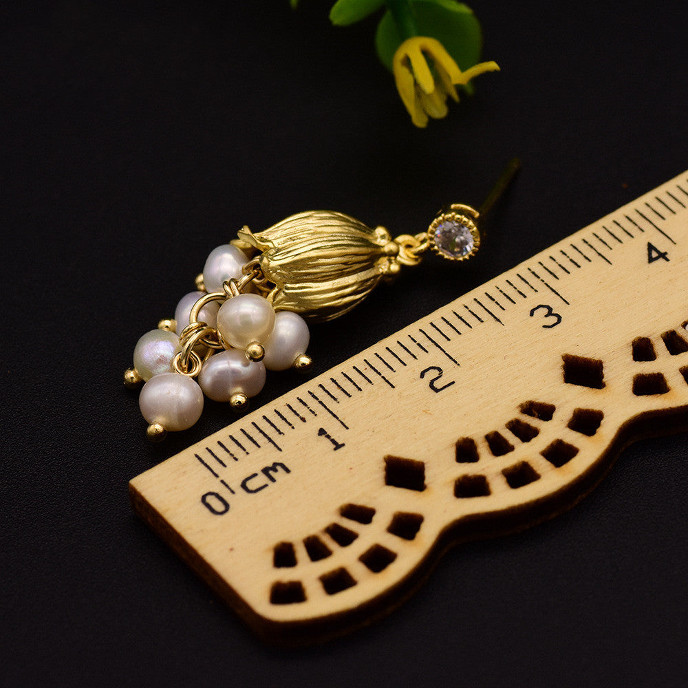 White Stud Earrings With Natural-shaped Pearls PrestigePearls