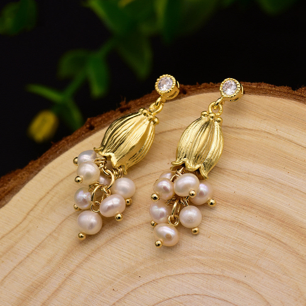 White Stud Earrings With Natural-shaped Pearls PrestigePearls